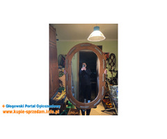 Ładne drewniane lustro z linami